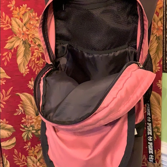 Pink back pack with large logo on bottom. - Picture 7 of 8
